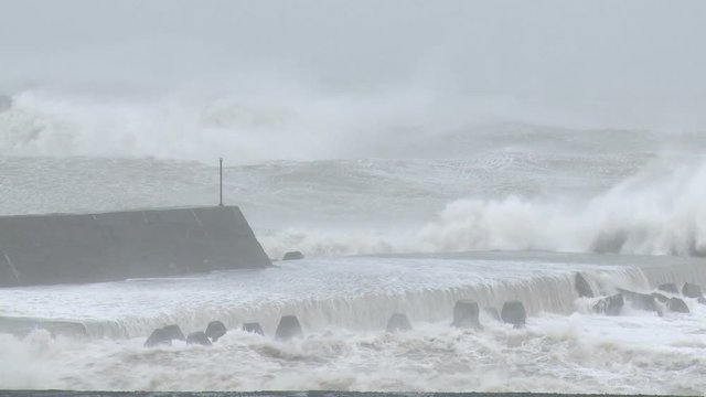 Hurricane Storm Surge Waves Crash Into Sea Wall - Usagi