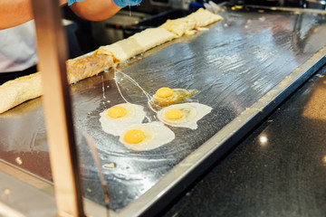 Fried and boiled eggs omelet breakfast in the kitchen