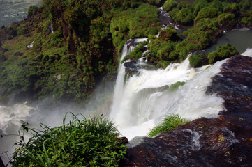 Naklejka na ściany i meble Iguazu River Falls between the countries of Argentina and Brazil