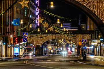 Fototapeta na wymiar Stockholm, Sweden Christmas decorations on Kungsgatan at Christmas time.