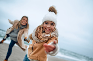 Family on the beach near the sea