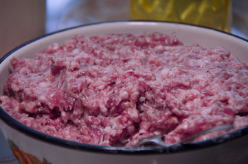  Fresh minced meat in a bowl. Cooking dumplings.