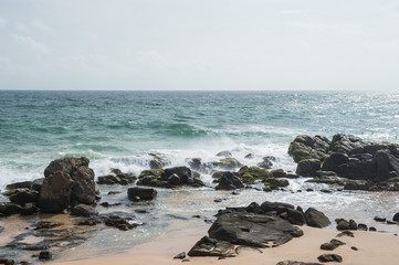 Fototapeta na wymiar Rocks on the shore of the Indian ocean, Galle, Sri Lanka