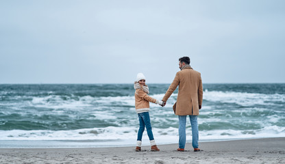 Family on the beach near the sea