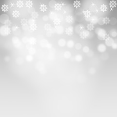 Snowflakes and snowfall on a cold blue winter background christmas