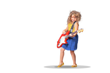 little girl with a guitar on the stage