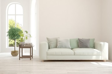 Stylish room in white color with sofa. Scandinavian interior design. 3D illustration