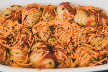 potato bake with carrots and tomato sauce