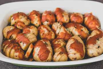 potato bake with herbs about to go in the oven