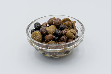 Mixture of olives seasoned with olive oil, garlic and oregano