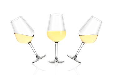 Three glasses of white wine isolated on white background. The glasses are tilted in different directions.
