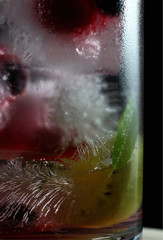 spectacular ice crystals with berries and fruit in a glass