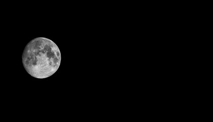 The Moon is the Earth's largest natural satellite and can be seen in the night sky.