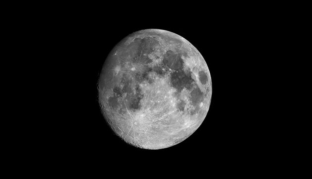 The Moon is the Earth's largest natural satellite and can be seen in the night sky.