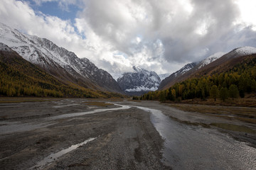 Autumn landscape with Aktru river and peak Karatash. Altai. Russia