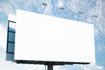 Obraz premium Empty white banner on blue sky background.