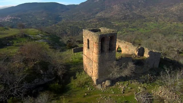 Orbit flight over a medieval castle ruins near Castillo de Bayuela - Toledo - Spain