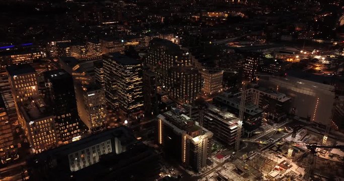 Aerial view of Oslo downtown Bjørvika during night with traffic and modern buildings