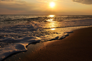 Beautiful sunset on sea during a storm