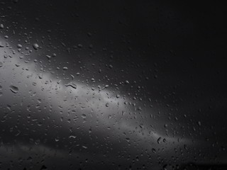  raindrops on gray storm day