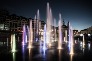Fototapeta na wymiar Musical colorful fountain