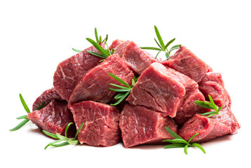 Sliced raw beef with rosemary herb isolated on white