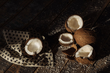Fototapeta na wymiar .coconut and milk , broken coconut, coconut on wooden boards background