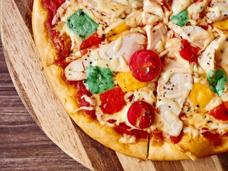 Fresh pizza wood desk table flat lay close up