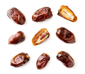 Set of fruit dates and two halves on a white background. The view of top.