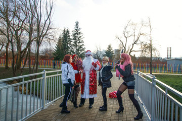 a thematic series of photos Xmas X-mas No More a group of beautiful hooligans meets Santa turning...