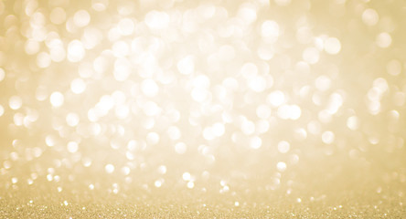 Fototapeta na wymiar Abstract gold bokeh with snow, Christmas and new year background