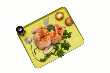 Fresh, whole chicken ready for marinating and frying. Top view, isolated on white background