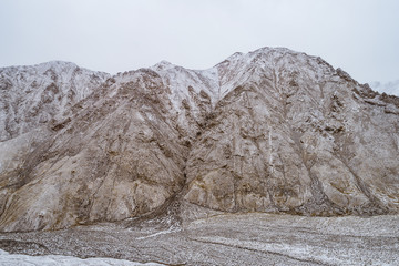 Fototapeta na wymiar lanscape with barren mountain which is covered with ice
