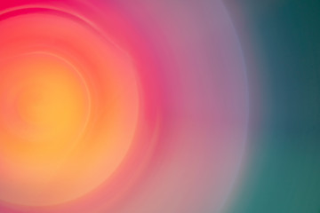 Obraz premium An abstract colored macro photograph using a long exposure and intentional camera movement to create a spiral pattern