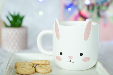 cup of tea with cookies on a background