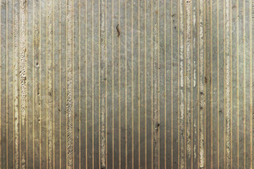 Grey striped plastic surface texture with stains, drops and cracks