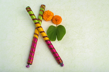 Indian Festival Dussehra, showing golden leaf (Bauhinia racemosa) and marigold flowers with Dandiya...