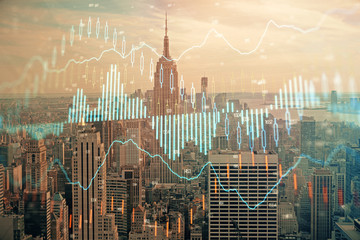 Forex graph on city view with skyscrapers background double exposure. Financial analysis concept.