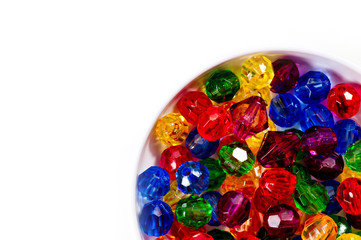 Multi-colored glass beads for beads and bracelets shot large on a white background