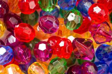 Multi-colored glass beads for beads and bracelets shot large on a white background