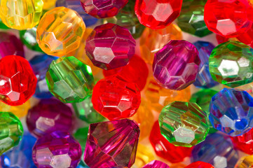 Multi-colored glass beads for beads and bracelets shot large on a white background