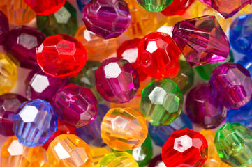 Multi-colored glass beads for beads and bracelets shot large on a white background