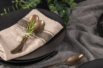 Table setting background with copy space. Background with napkin, silverware and rosemary branch....