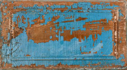 blue vintage or shabby style wooden board. paint peeling off a wooden board. old wood background