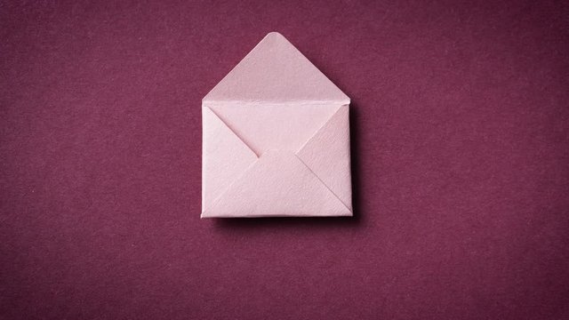 Envelope with letter, stop motion animation. Paper art.