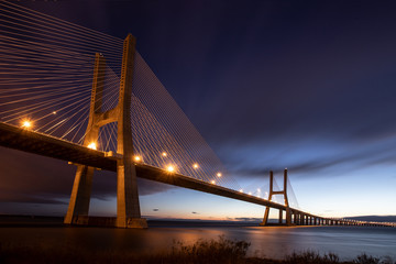 bridge Vasco da Gama in Lisboa, Portugal to the sunrise