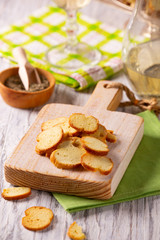 Tasty crackers on a cutting board on the table