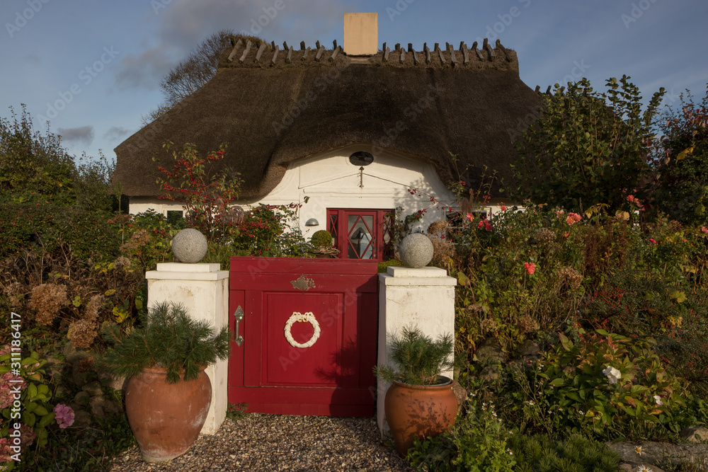 Poster thatched cottage with garden