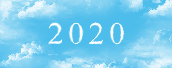 Naklejka na ściany i meble 2020 Happy New Year Cloud form against the blue sky