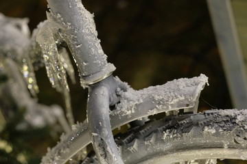 detail of a frozen bicycle